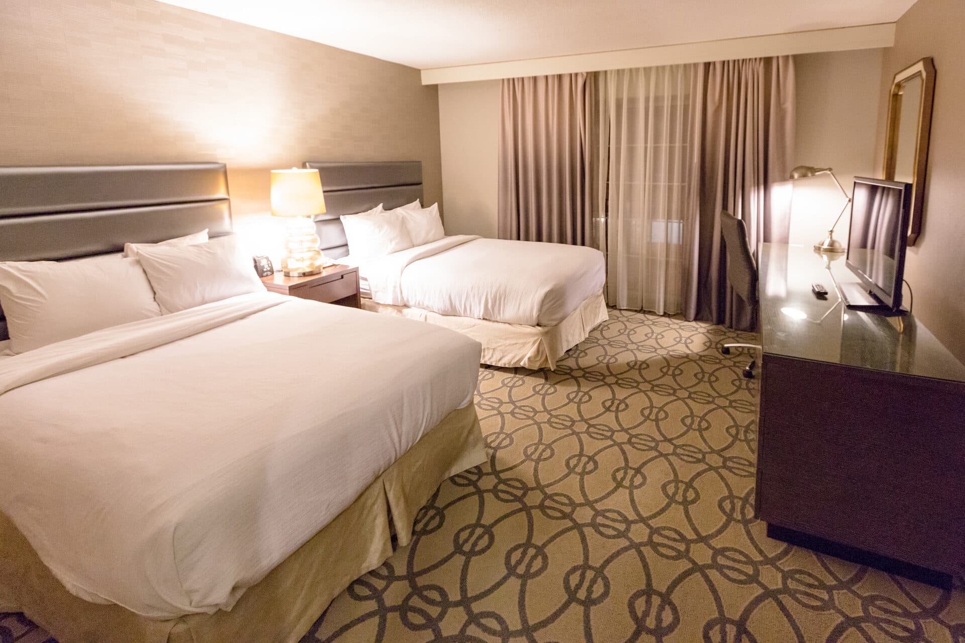Modern hotel room with two beds